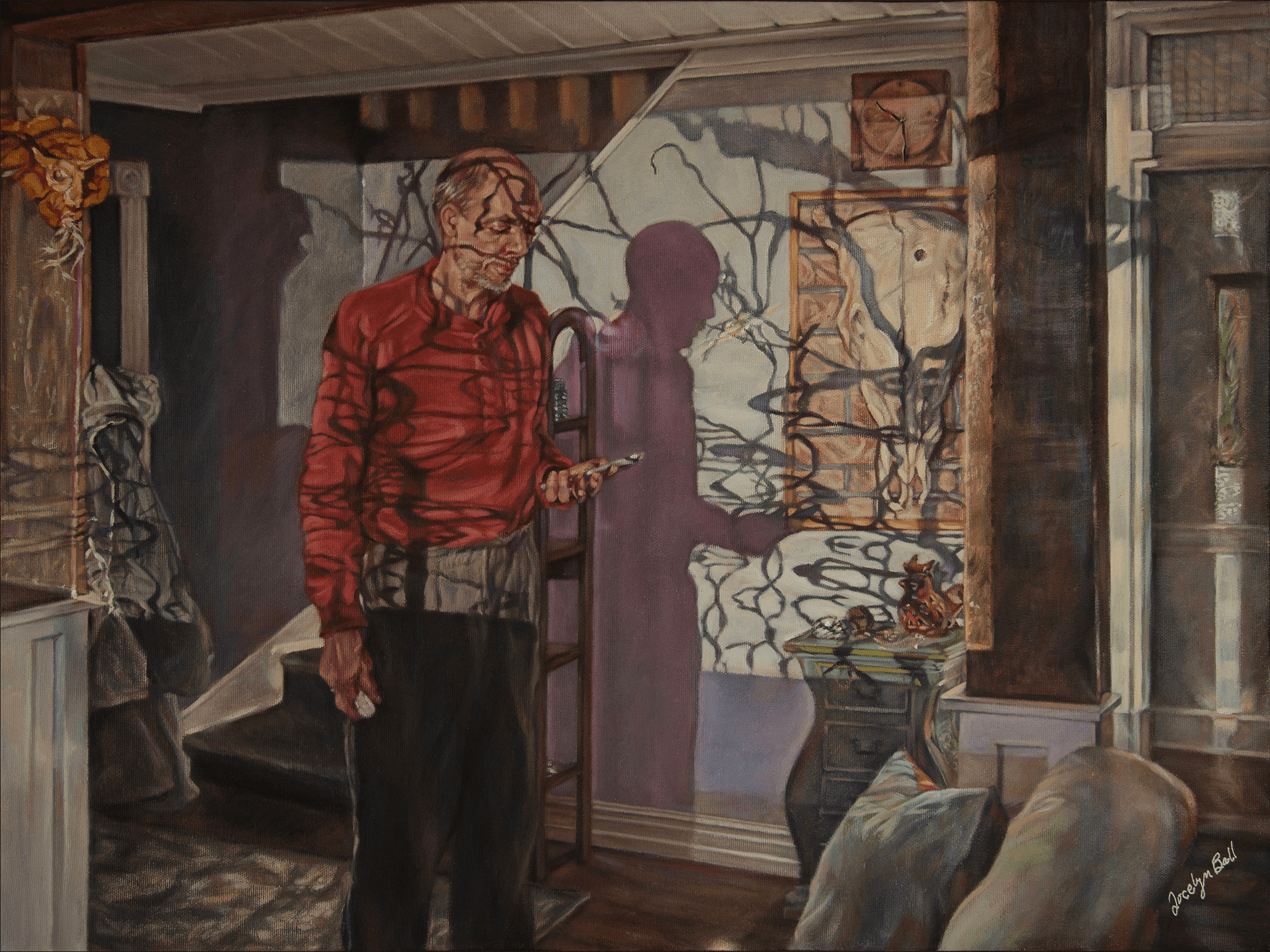 man standing in living room with projections cast across his body